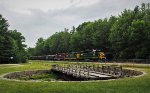 The southbound quarry train rolls past the ex-B&M turntable in Sanbornville, NH